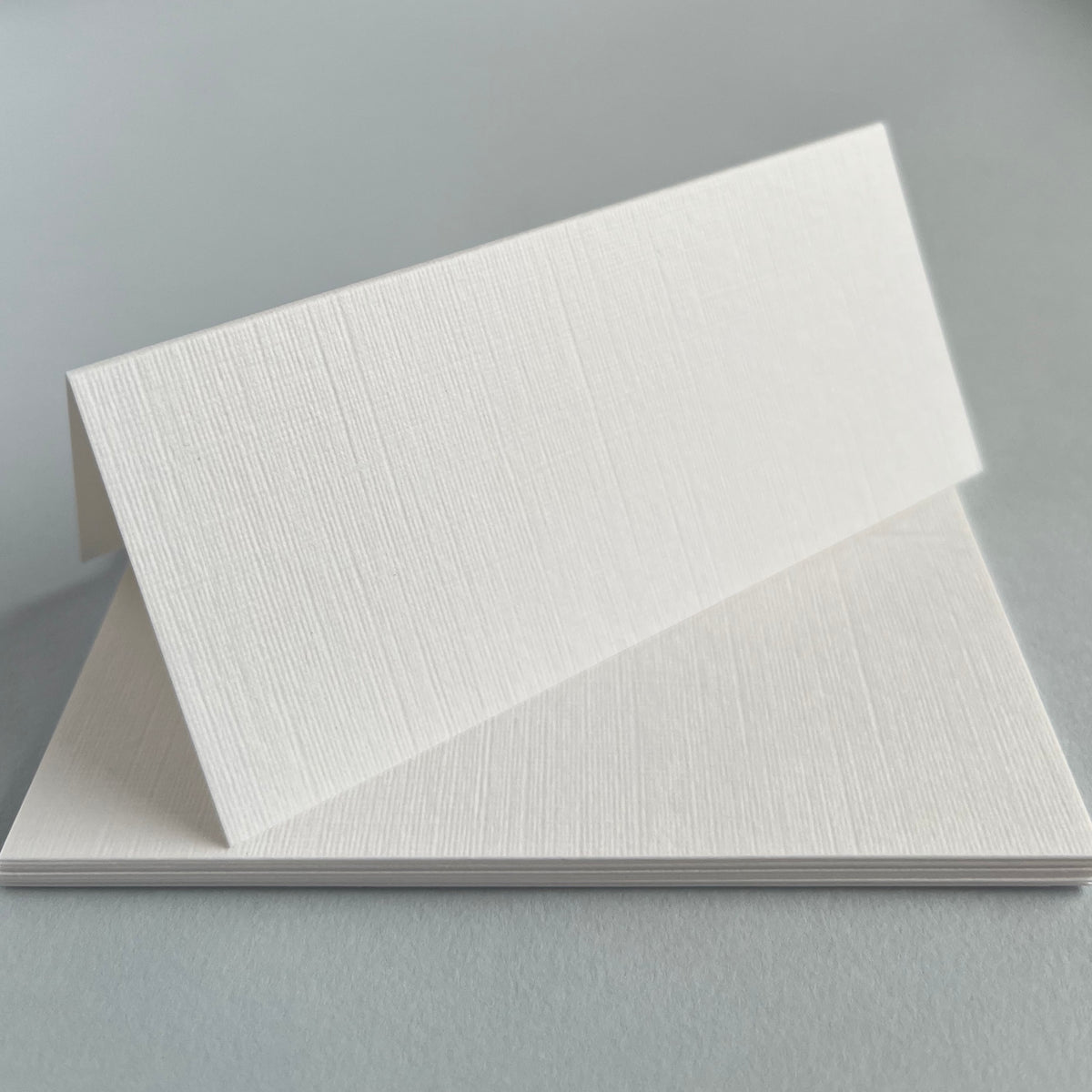 White Linen Embossed Place Cards